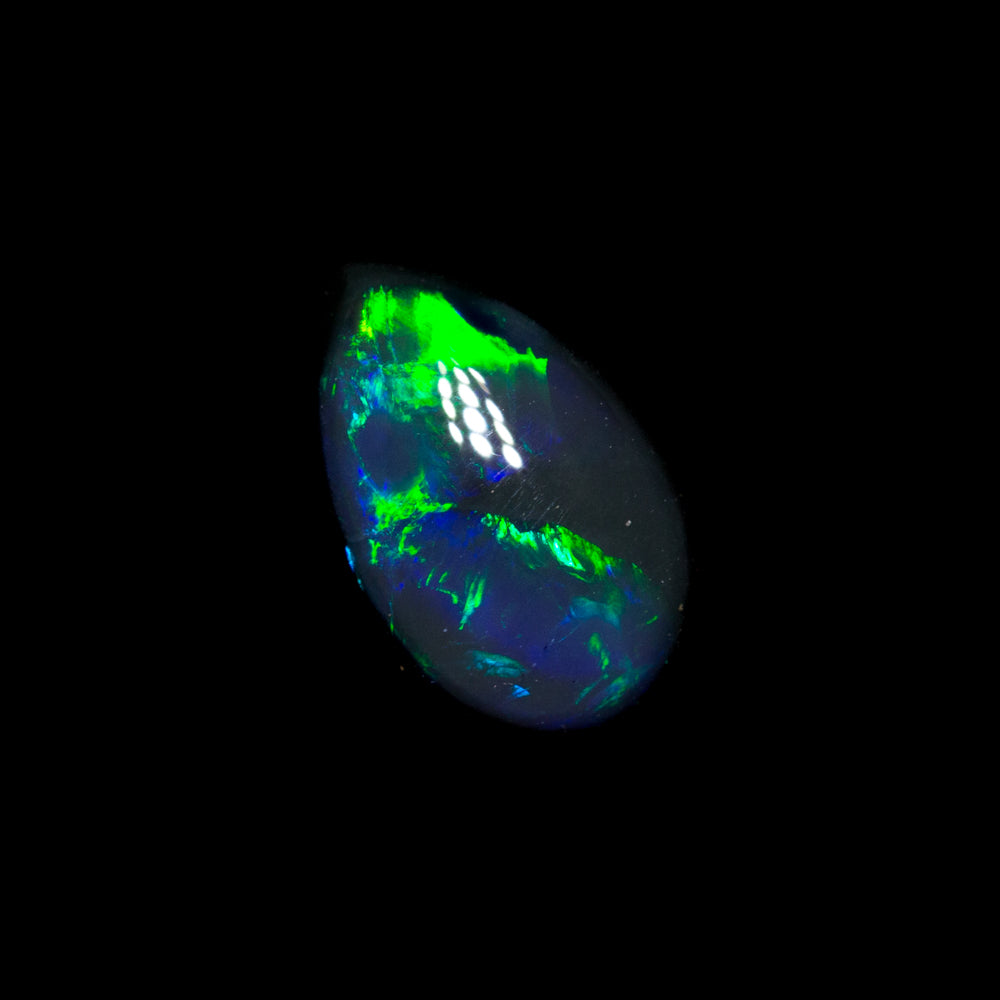 0.65 ct black opal 7.4x4.8x2.9mm