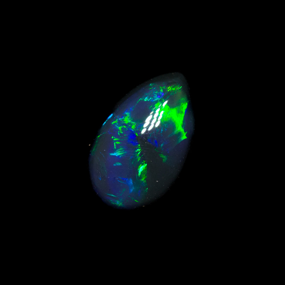 0.65 ct black opal 7.4x4.8x2.9mm