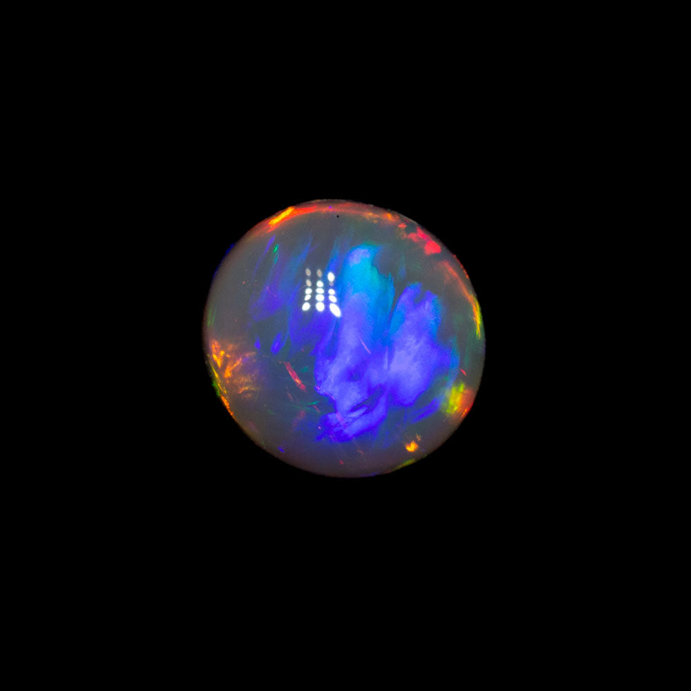 0.65 ct black crystal opal 5.9x5.6x3.3mm