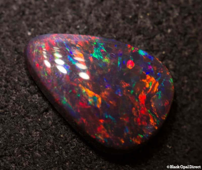 0.65 ct gem drop shaped black opal 9x6x2mm