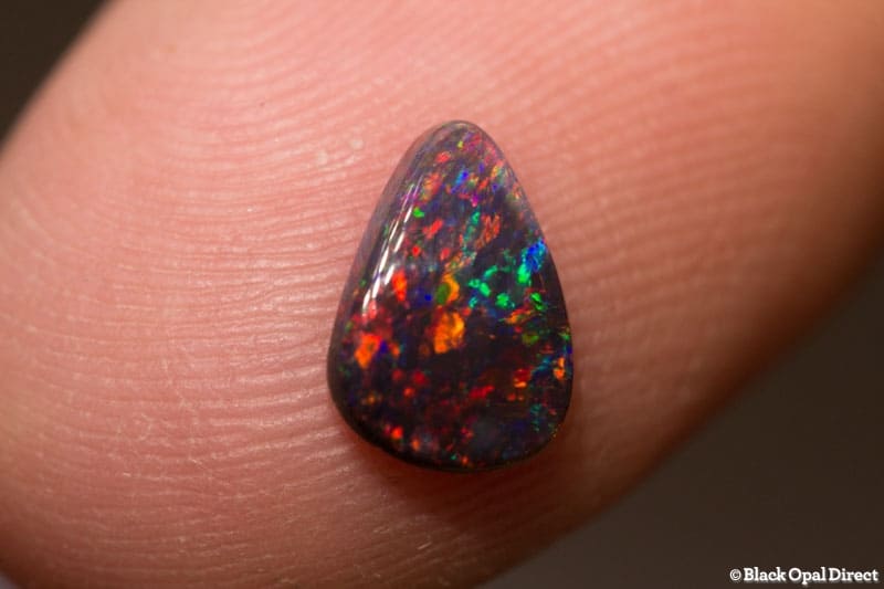 0.65 ct gem drop shaped black opal 9x6x2mm