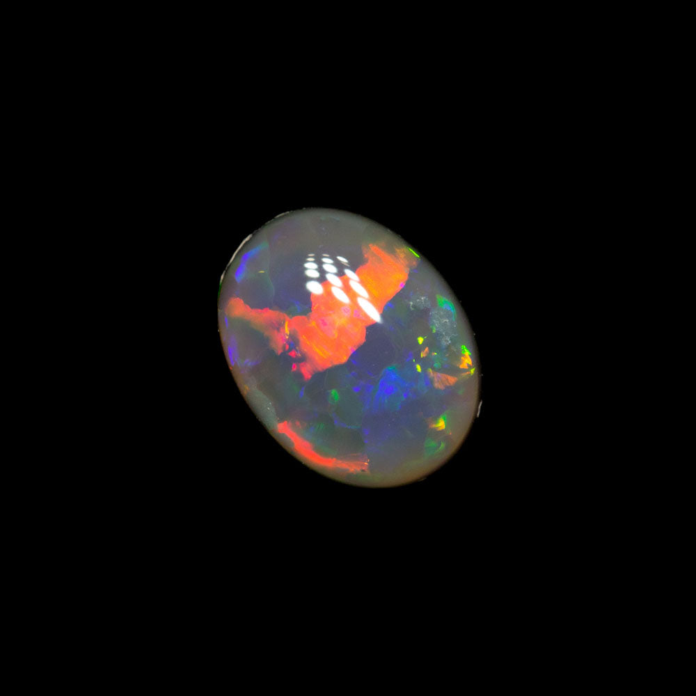 0.66 ct dark opal 6.7x5.2x2.8mm