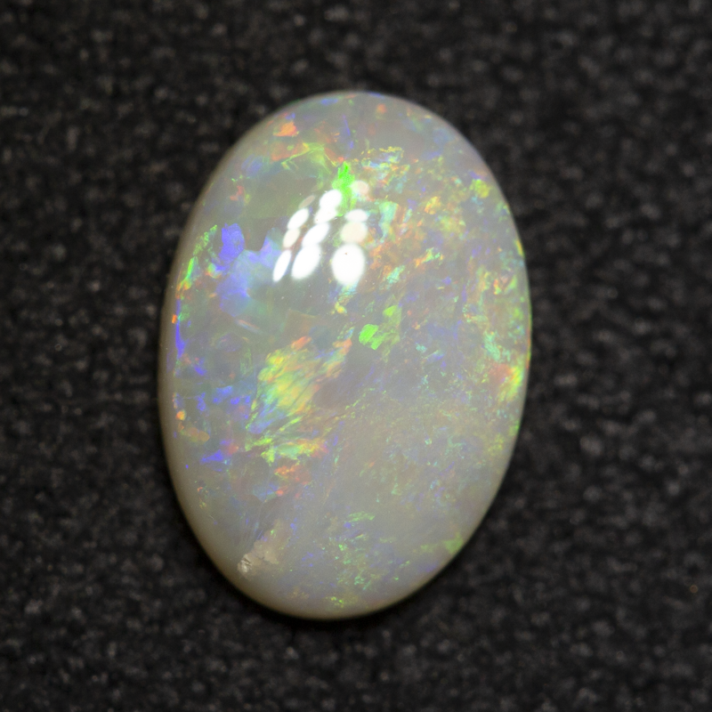 0.66 ct white opal 8x5.6x2.2mm