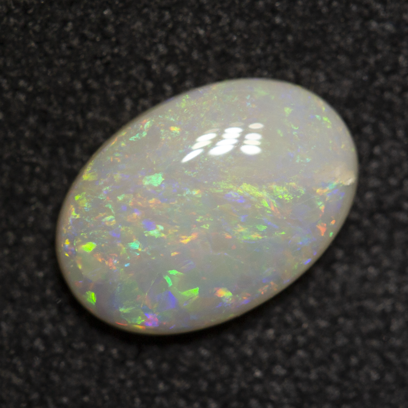 0.66 ct white opal 8x5.6x2.2mm