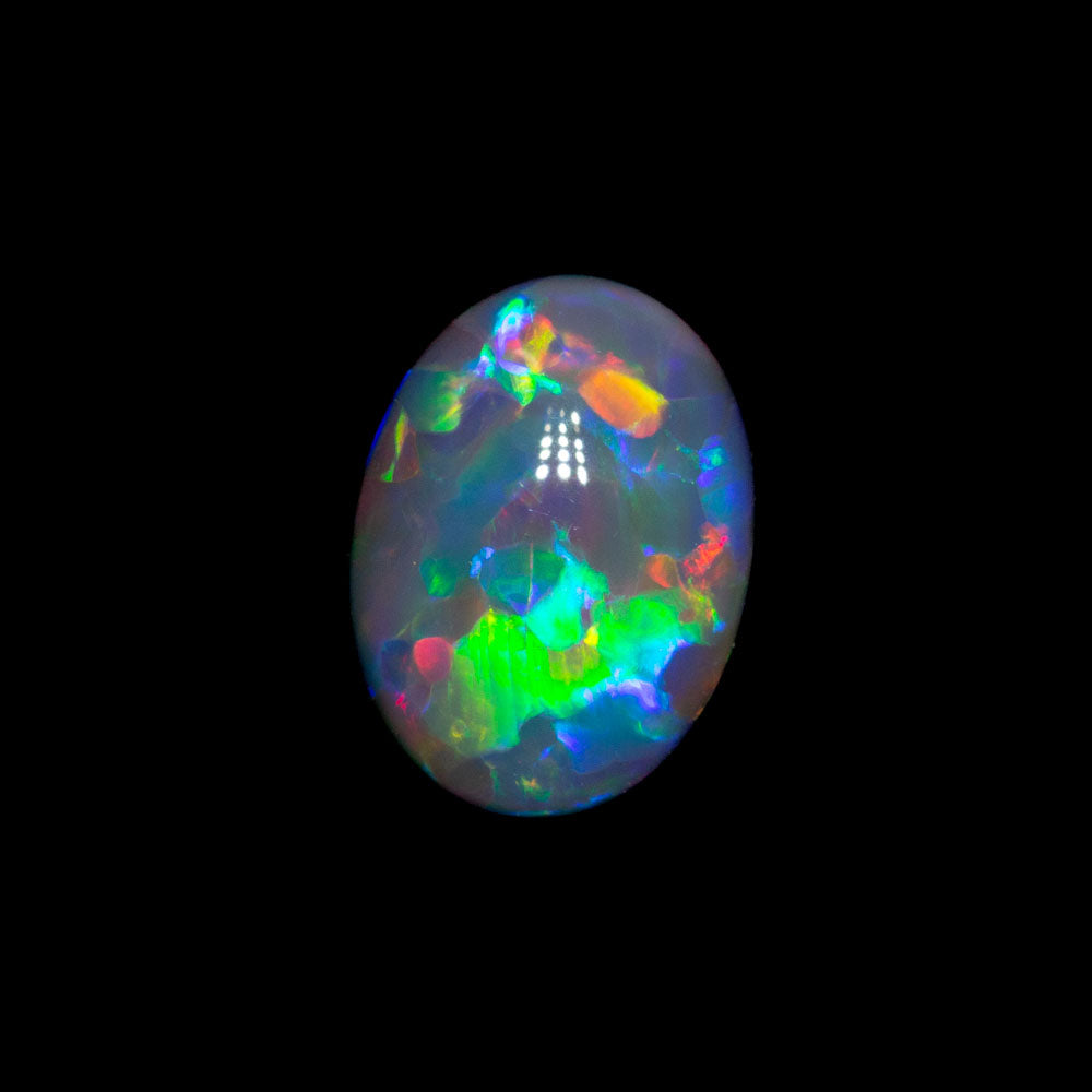 0.66 ct gem double-sided black opal 7.1x5.2x2.9mm