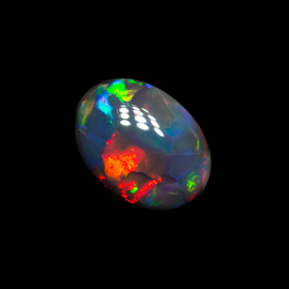0.66 ct gem double-sided black opal 7.1x5.2x2.9mm