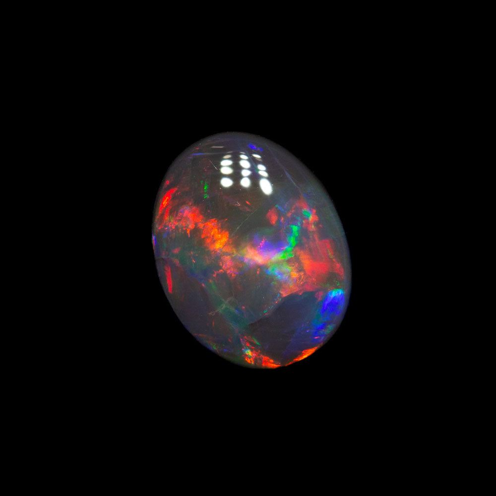 0.66 ct black opal 7.1x5.7x2.4mm
