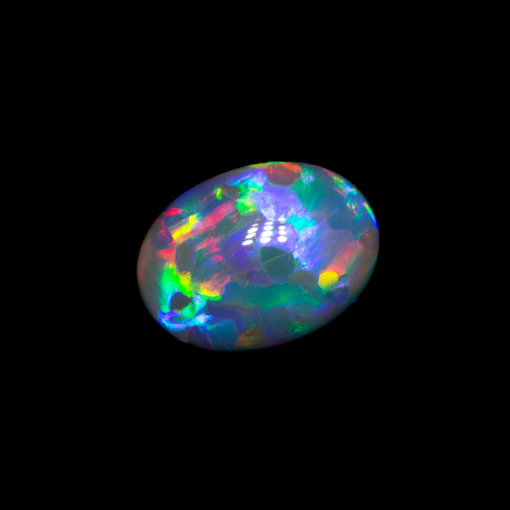 0.66 ct gem double-sided black opal 7.1x5.2x2.9mm