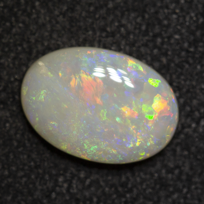 0.66 ct white opal 8x5.6x2.2mm
