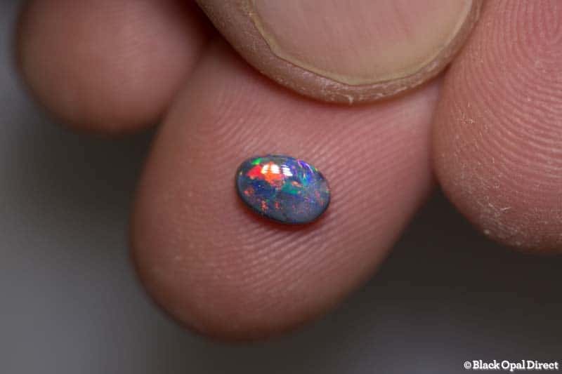 0.66 ct black opal 6.8x4.5x2.9mm