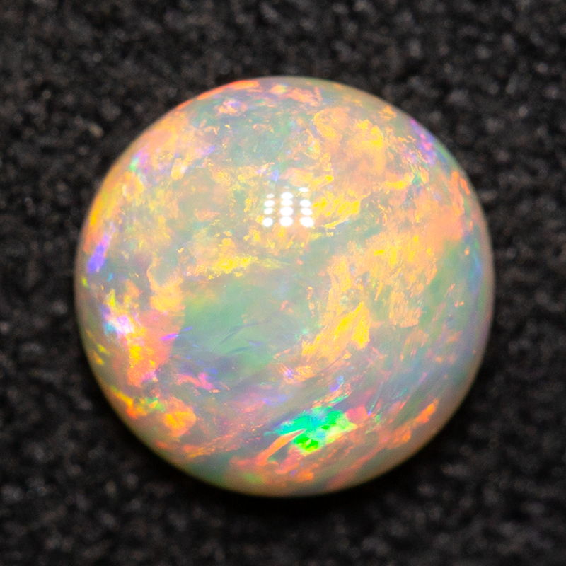 0.67 ct white opal 6.1x6.1x3mm