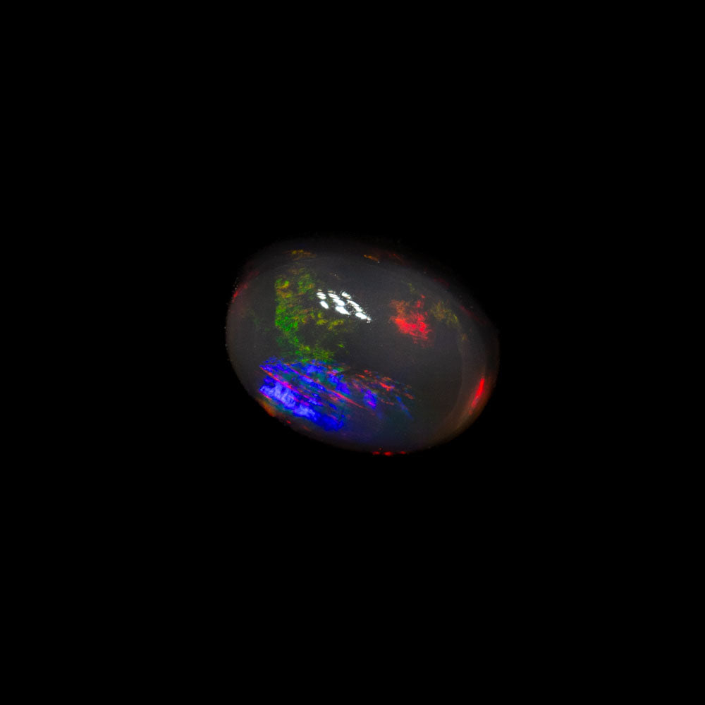 0.68 ct black opal 6.3x4.7x3.2mm