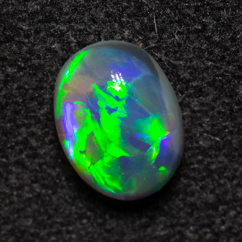 0.68 ct black opal 6.8x5.1x3mm