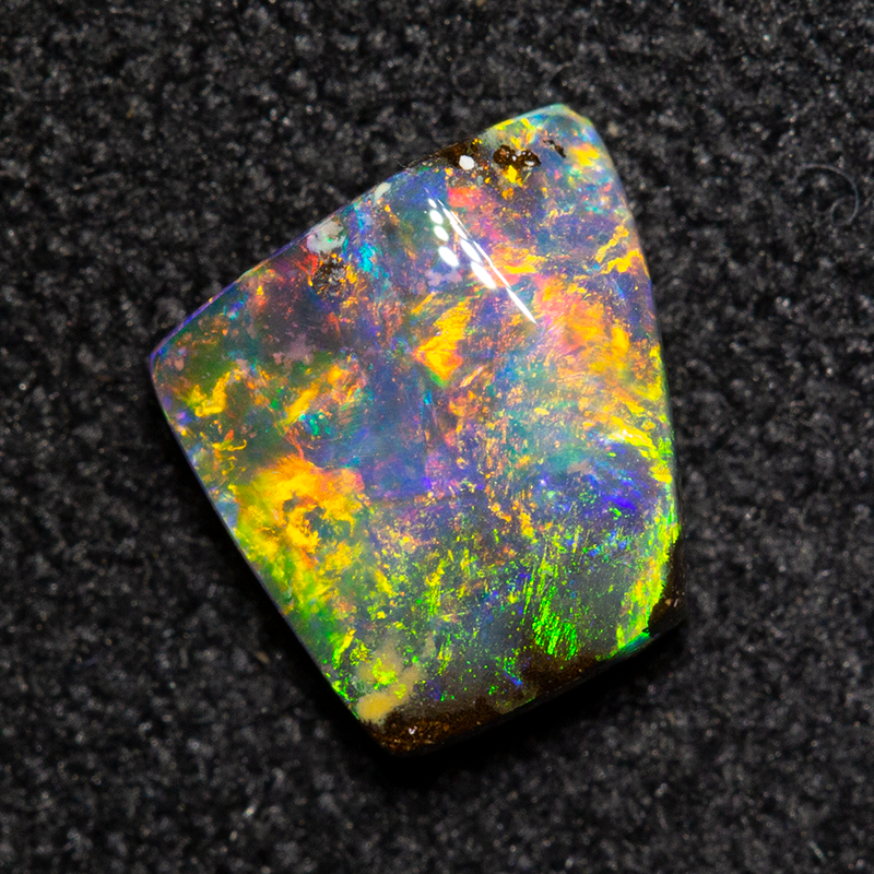 0.68 ct boulder opal 6x5.6x2.1mm