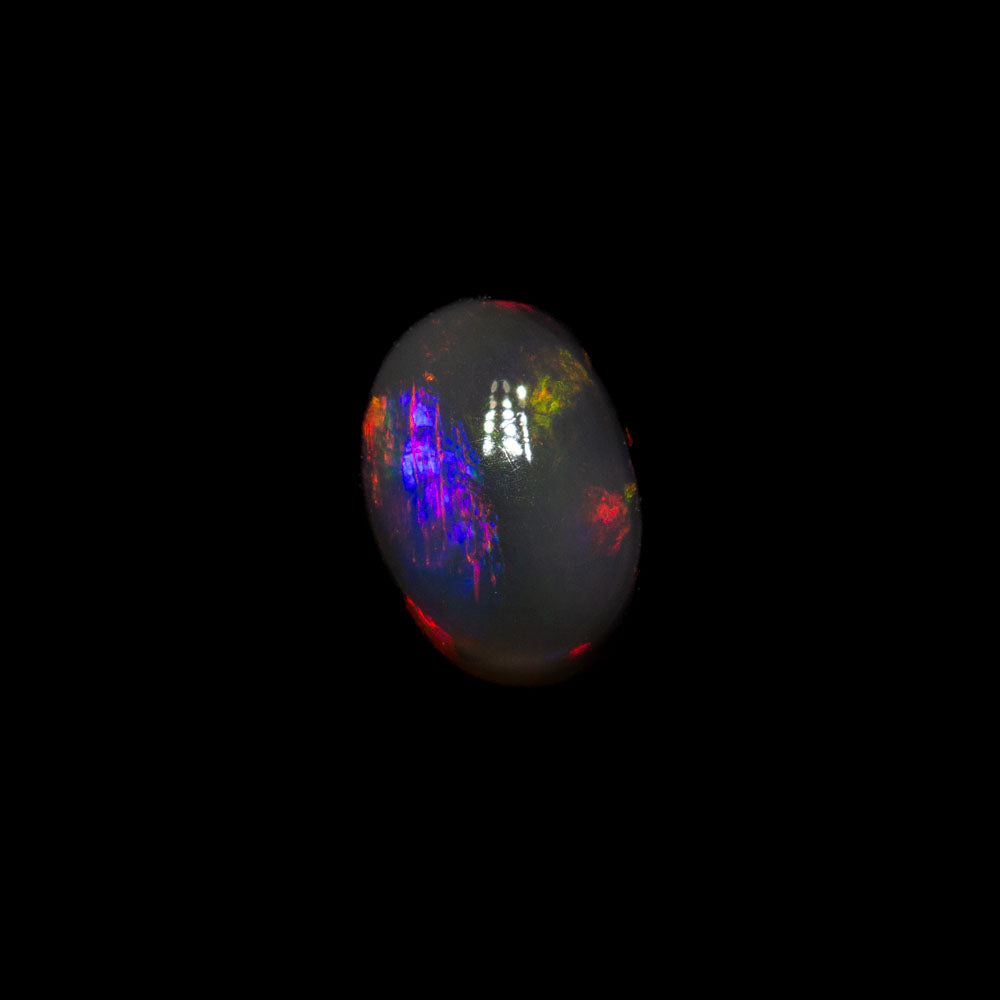 0.68 ct black opal 6.3x4.7x3.2mm