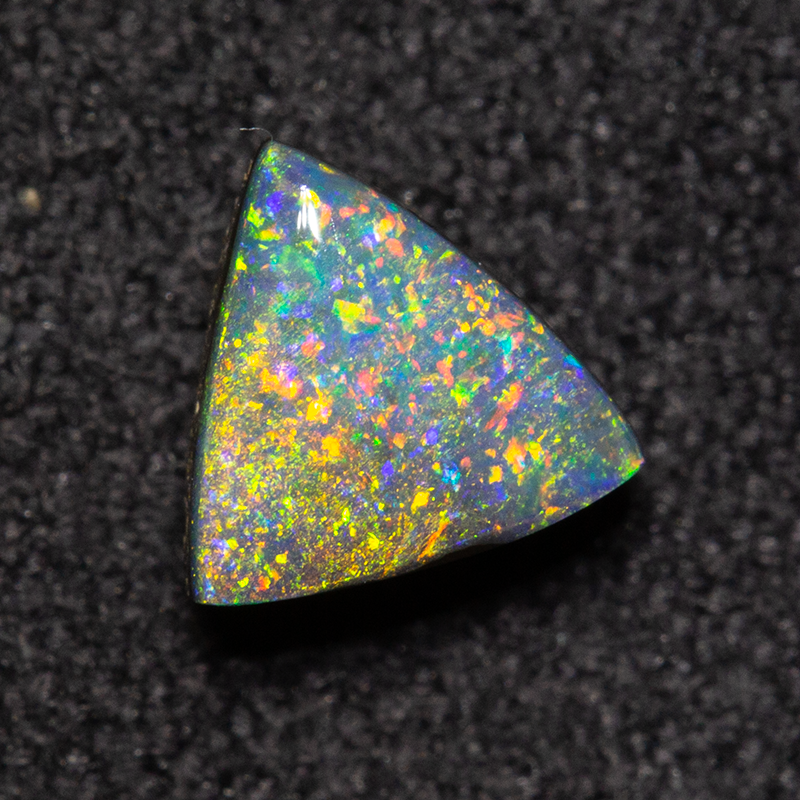 0.70 ct boulder opal 5.8x5.5x3.3mm