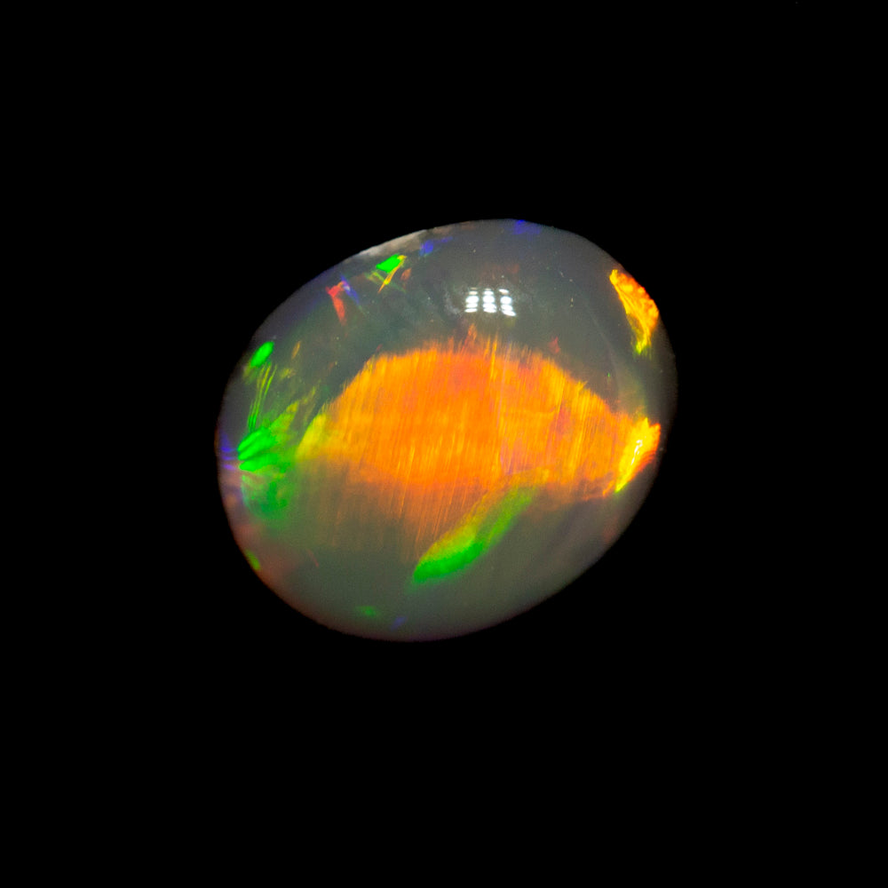 0.70 ct black opal 6.7x5.6x3mm