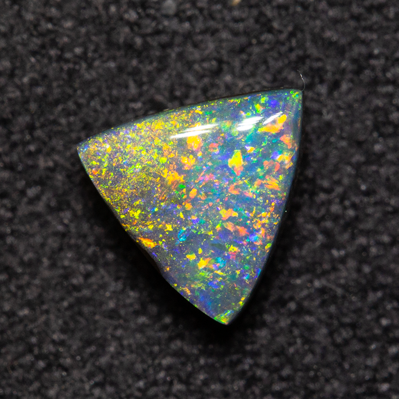0.70 ct boulder opal 5.8x5.5x3.3mm