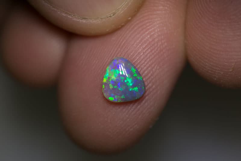 0.70ct dark opal 7x6.5x2mm