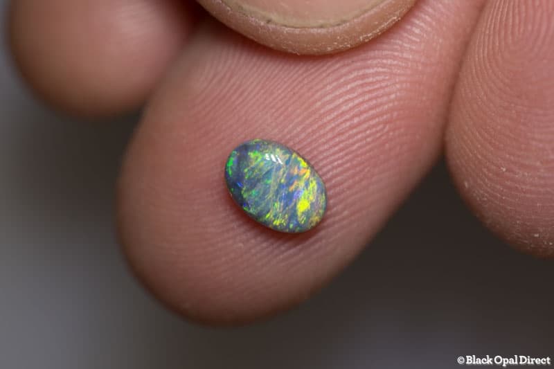 0.70 ct semi black opal 7x5x2.5mm