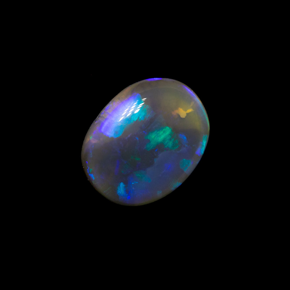 0.71 ct black crystal opal 7.2x5.7x2.8mm