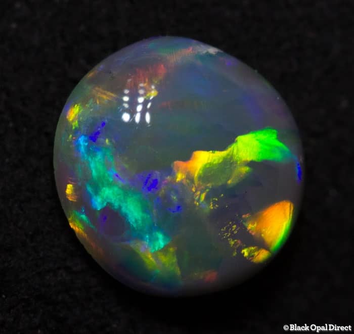 0.71 ct semi black opal 7x6.5x3.5mm