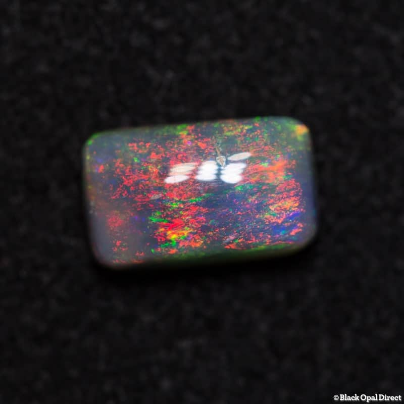 0.71ct semi black opal
