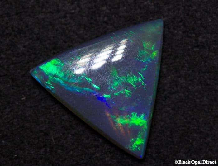 0.71ct triangle semi black opal