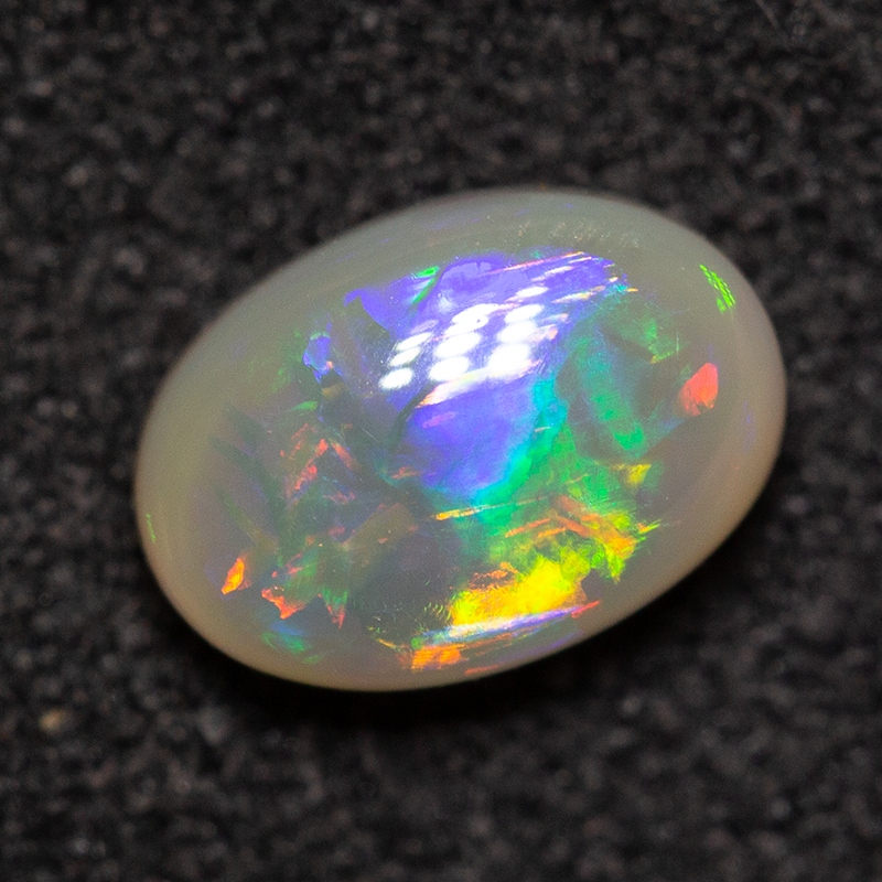 0.72 ct dark opal 7.1x5x3.1mm