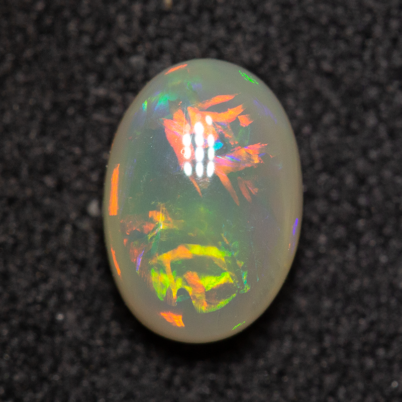0.72 ct dark opal 7.1x5x3.1mm