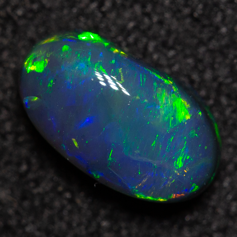 0.72 ct black opal 7.4x4.2x3.2mm