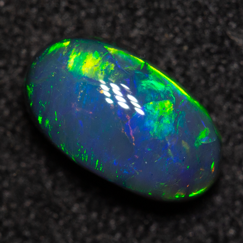 0.72 ct black opal 7.4x4.2x3.2mm