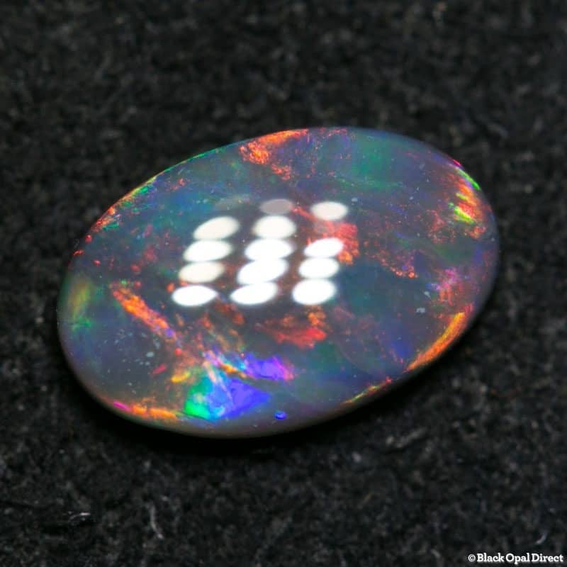 0.71 ct black opal 8x5x2.5mm