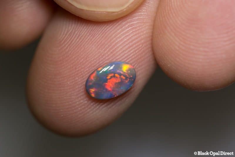 0.71 ct black opal 8x5x2.5mm