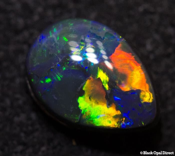 0.72 ct black opal drop shape 7.5x5x3mm