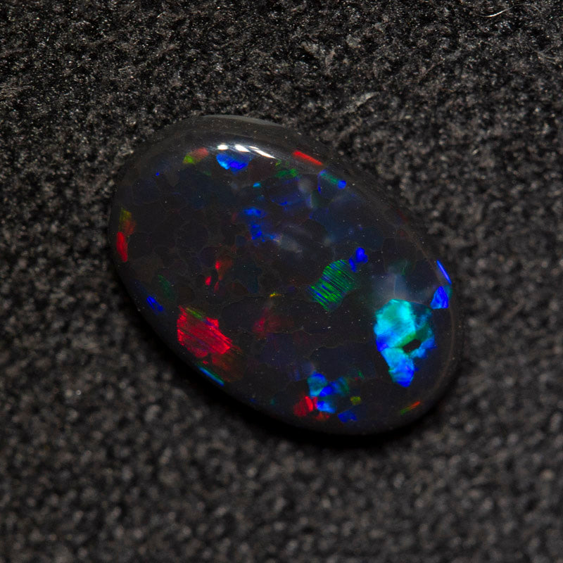 0.74 ct black opal 8.8x5.8x2.1mm