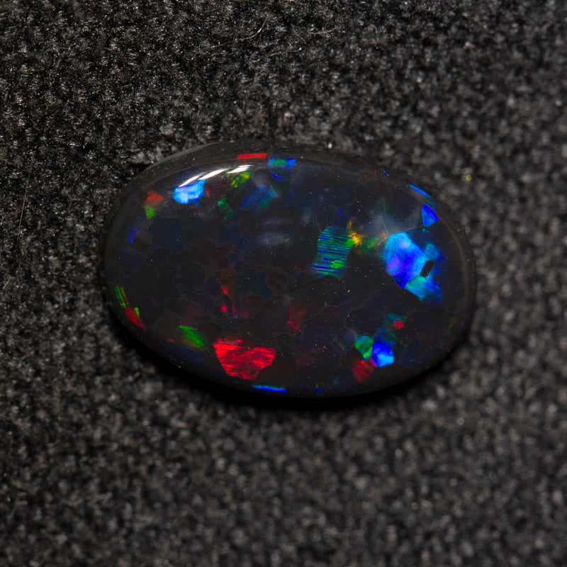0.74 ct black opal 8.8x5.8x2.1mm