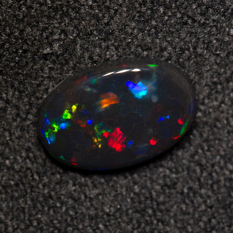 0.74 ct black opal 8.8x5.8x2.1mm