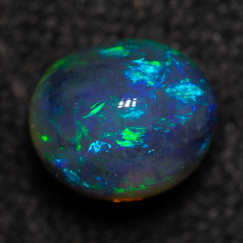 0.75 ct black crystal opal 5.5x4.8x4.7mm