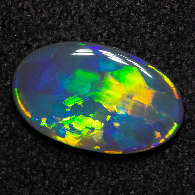 0.75 ct black opal gem 9.5x6x2mm