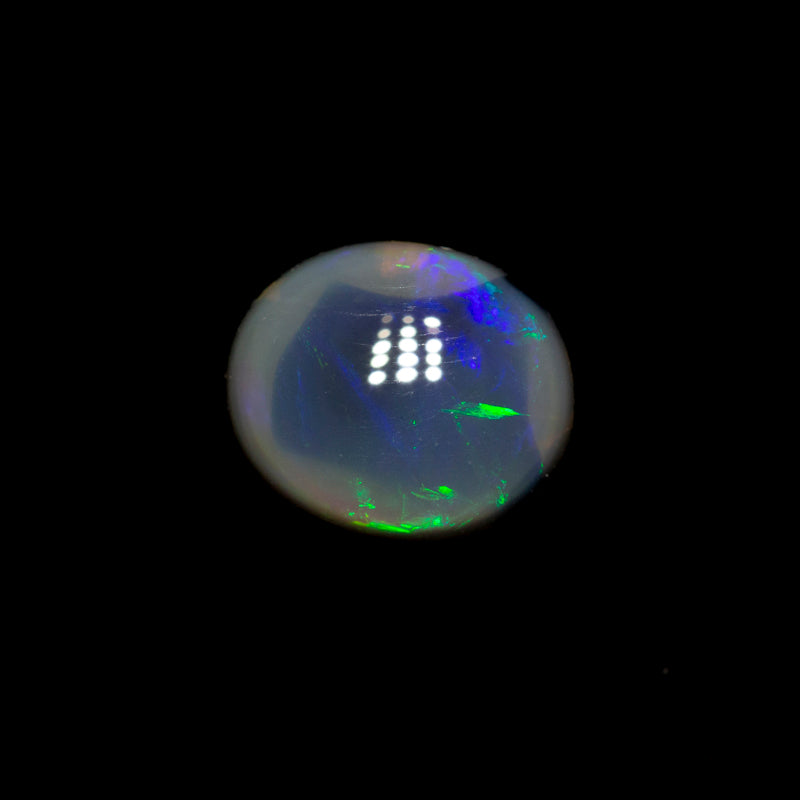 0.75 ct black opal 6.9x5.8x3.1mm