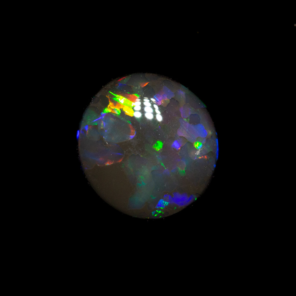 0.75 ct black opal 7.2x6.8x2.6mm