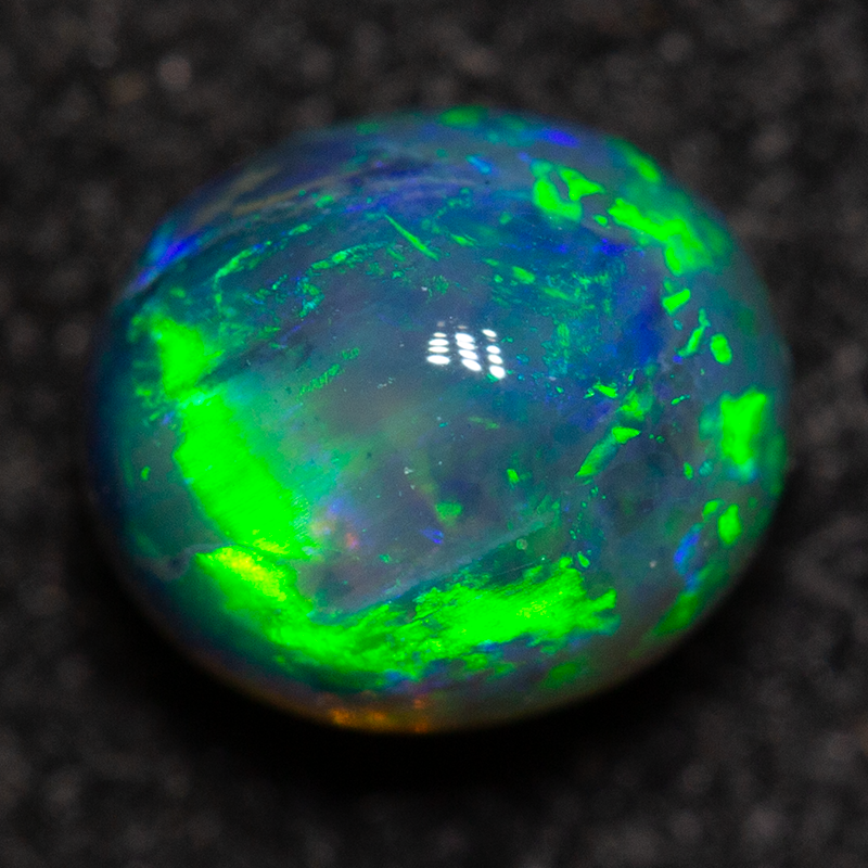 0.75 ct black crystal opal 5.5x4.8x4.7mm