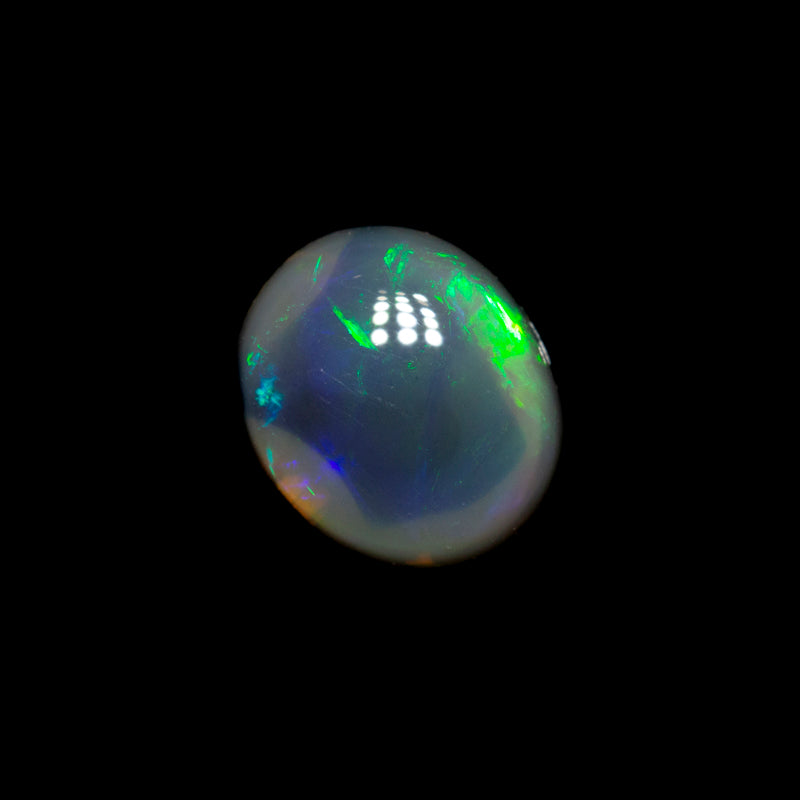 0.75 ct black opal 6.9x5.8x3.1mm