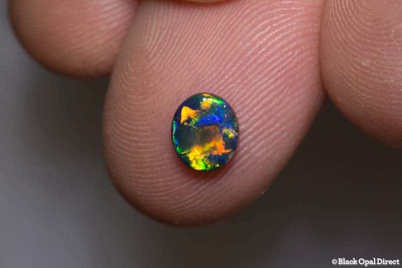 0.75 ct top gem black opal 7x6x2mm