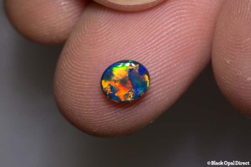 0.75 ct top gem black opal 7x6x2mm