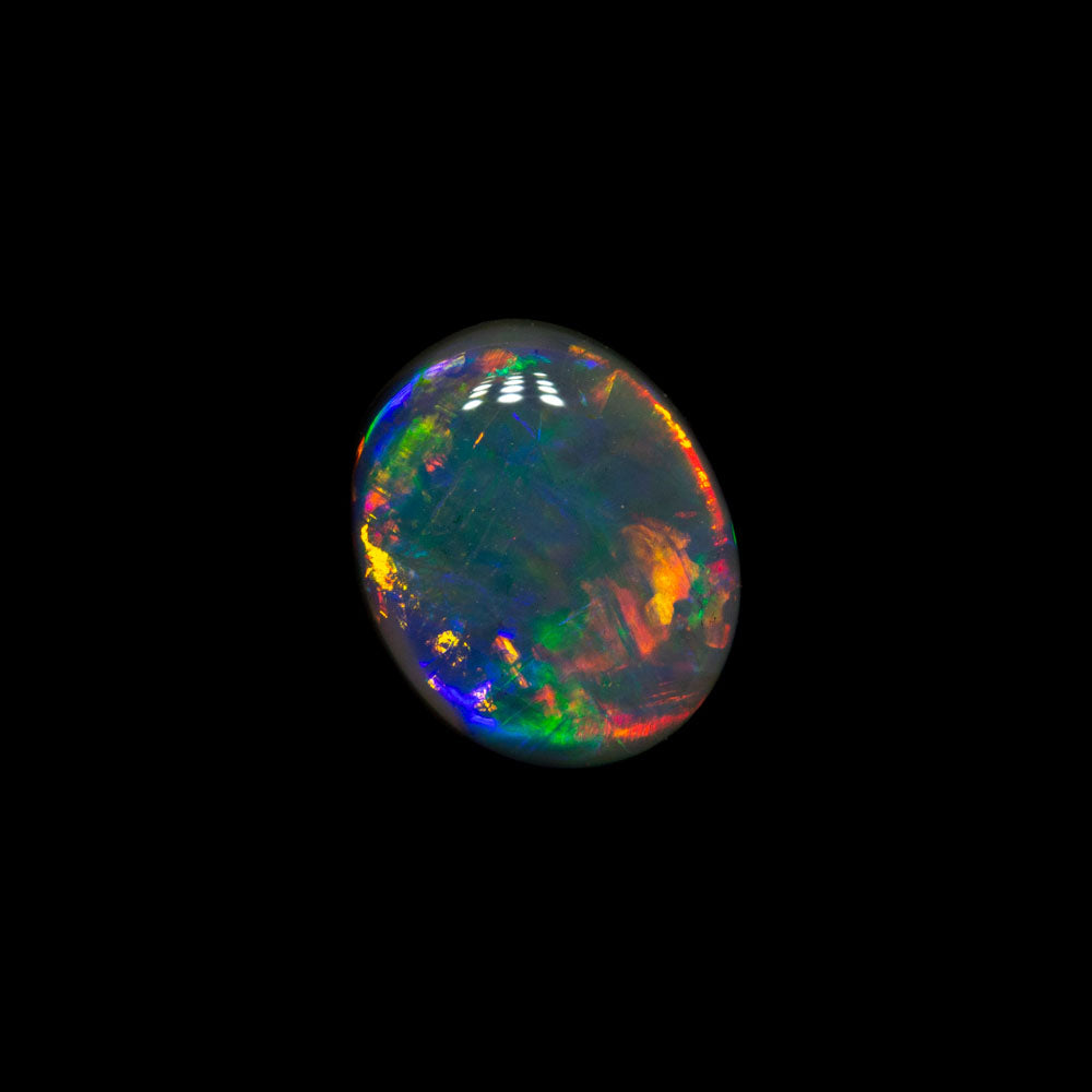 0.76 ct dark opal 7.1x5.9x2.6mm