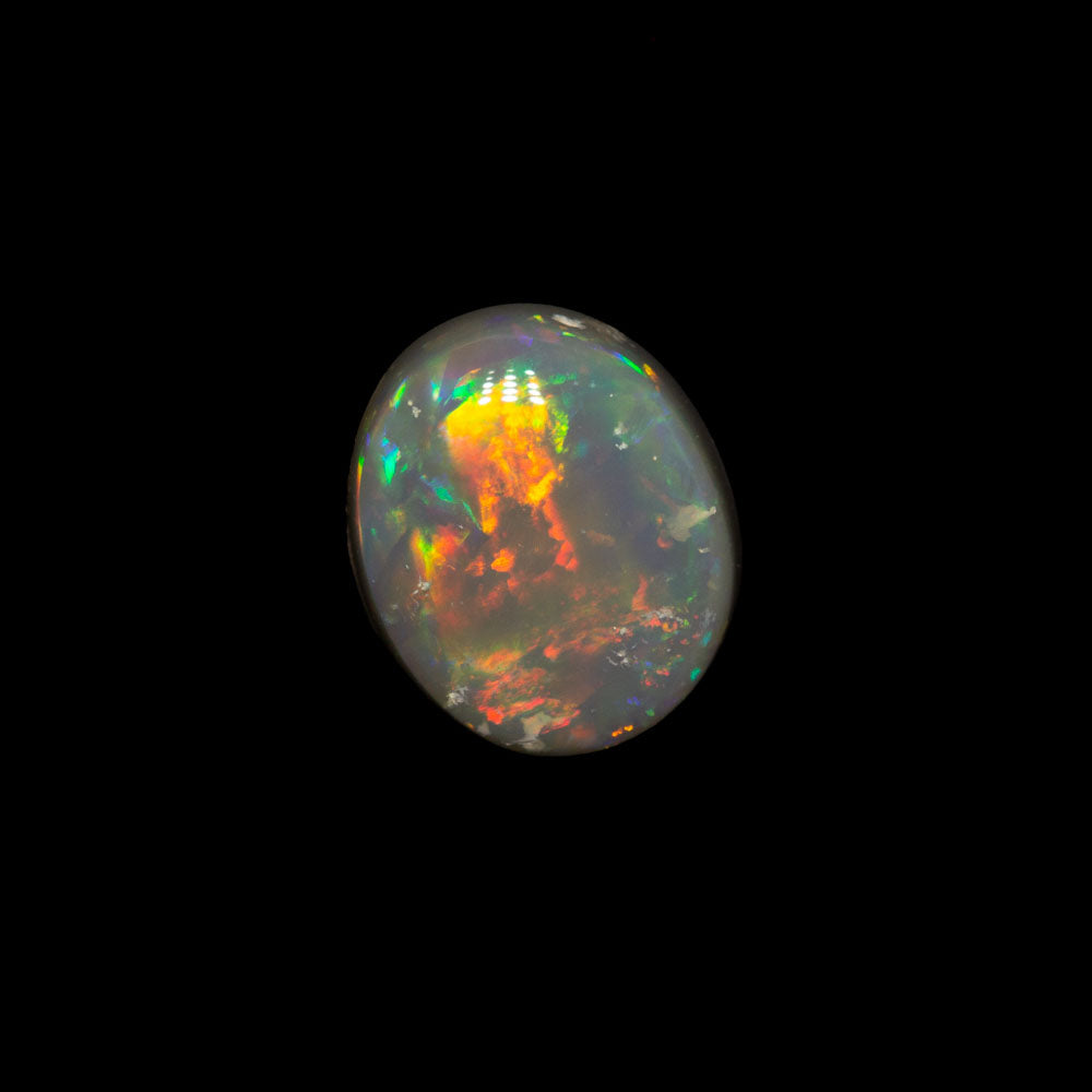 0.76 ct dark opal 6.8x5.7x2.9mm