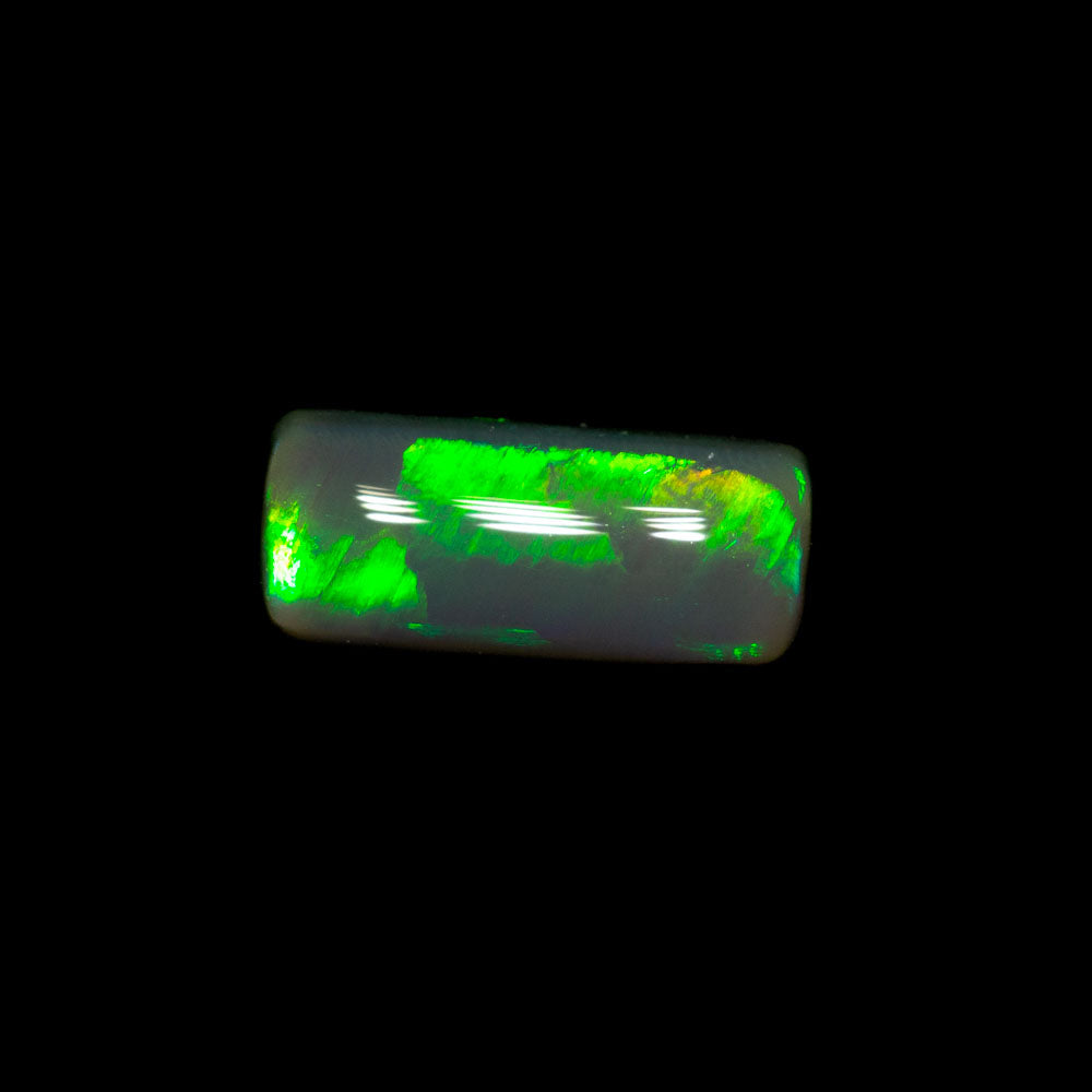 0.76 ct black crystal opal 8.3x3.6x2.9mm