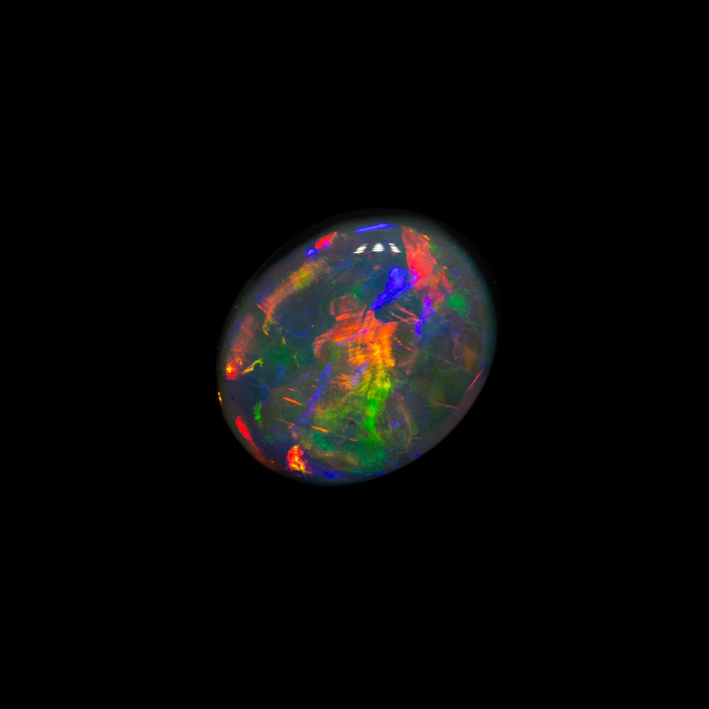 0.76 ct dark opal 7.1x5.9x2.6mm